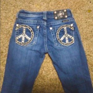 Size 26 Miss Me Jeans. Peace signs on pockets